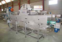 Remplisseuse linéaire par débordement et vibration, modèle Universal